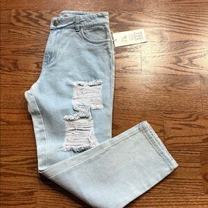 Women’s Light Wash Distressed torn leg denim Jeans 5 pocket size 10